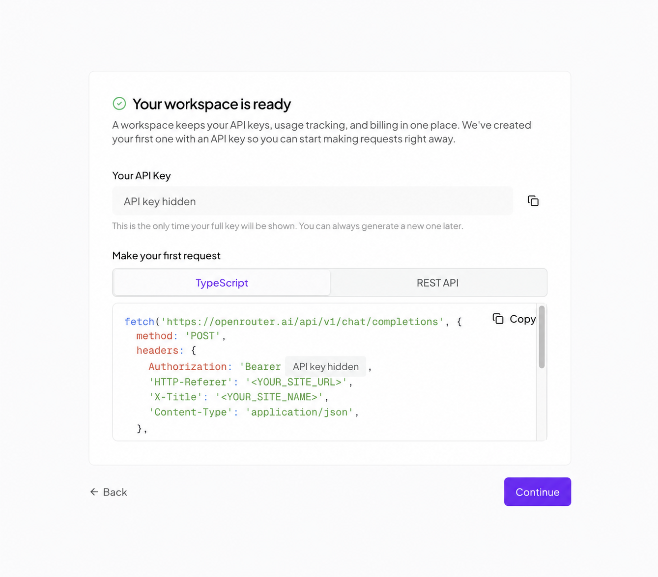 OpenRouter workspace screen with the starter API key redacted